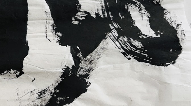 Abstract black ink calligraphy representing tension and movement, illustrating the invisible conflict between professional values and working conditions